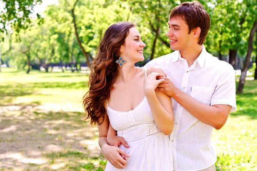 couple hugging in the park, have a good time together