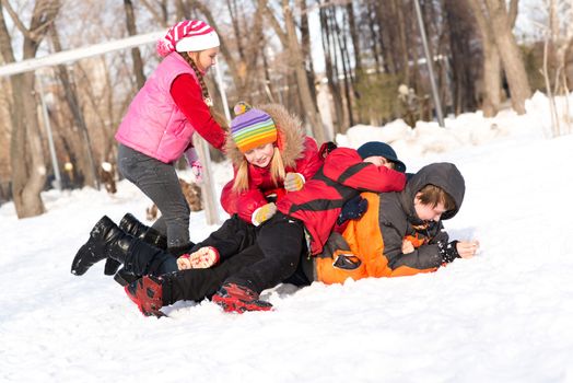 Children in Winter Park fooled in the snow, actively spending time outdoors