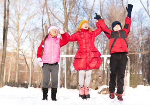 Children in Winter Park fooled in the snow, actively spending time outdoors