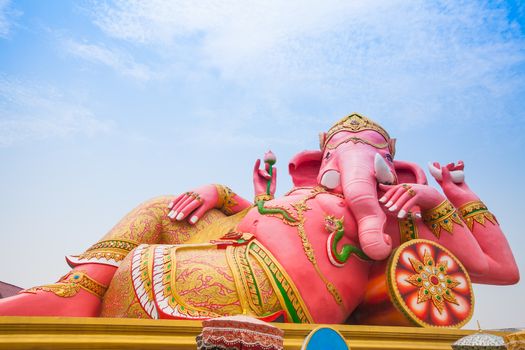 Pink ganesha in relaxing protrait on blue sky, Thailand.