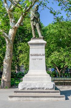 NEW YORK - JUNE 1: Monument to Garibaldi in Washington Square, New York on June 1, 2013.This monument was dedicated in June 1888 to General G. Garibaldi, the 19th century Italian patriot who crusaded for a unified Italy during the European era of state building. 