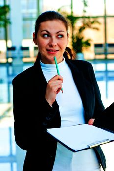 Smiling brunette pondered attractive offer