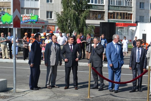 The governor of the Tyumen region Vladimir Yakushev at official opening of a new traffic intersection on Melnikayte St., Tyumen. 22.08.2013