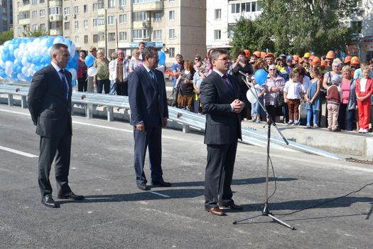 The governor of the Tyumen region Vladimir Yakushev at official opening of a new traffic intersection on Melnikayte St., Tyumen. 22.08.2013