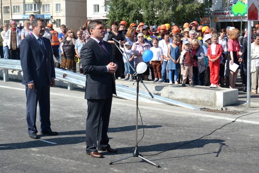 The governor of the Tyumen region Vladimir Yakushev at official opening of a new traffic intersection on Melnikayte St., Tyumen. 22.08.2013