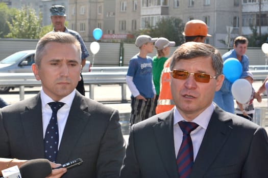 The governor of the Tyumen region Vladimir Yakushev at official opening of a new traffic intersection on Melnikayte St., Tyumen. 22.08.2013