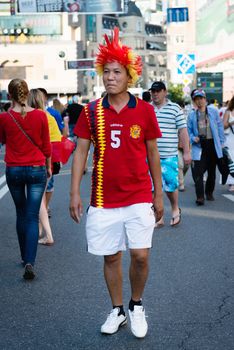 KIEV, UKRAINE - JUL 1: Spanish football fan goes to EURO 2012 final match Spain vs. Italy on July 1, 2012 in Kiev, Ukraine