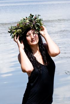 Beautiful girl bohemian style in the lake