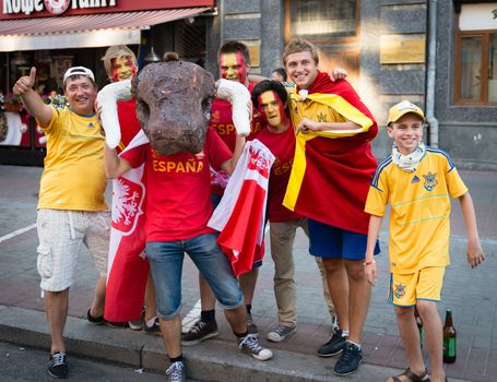KIEV, UKRAINE - JUL 1: Spanish football fans are photographed with Ukrainian fans before EURO 2012 final match Spain vs. Italy on July 1, 2012 in Kiev, Ukraine