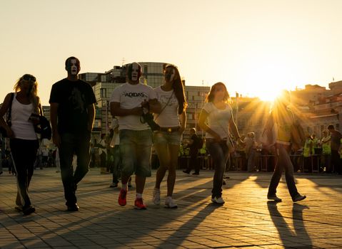 KIEV, UKRAINE - JUL 1: Italian football fans go to EURO 2012 final match Spain vs. Italy on July 1, 2012 in Kiev, Ukraine