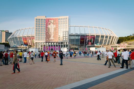 KIEV, UKRAINE - JUL 1: People in front of the  stadium before EURO 2012 final match Spain vs. Italy on July 1, 2012 in Kiev, Ukraine