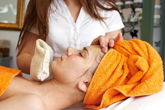 Young woman in beauty salon getting beautiful