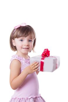 Smiling little girl holding present box over white
