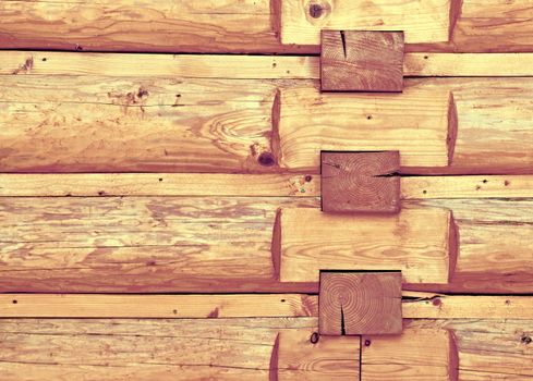 background or texture of a wooden log cabin wall