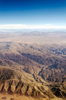 View of a dry desert from an airplane somewhere over South America