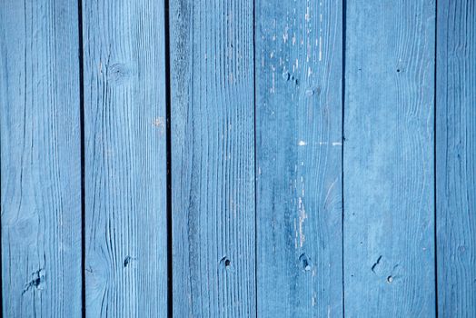 fence coated with a thin layer of blue