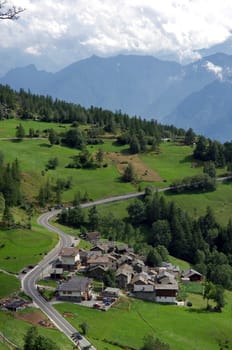 group of houses along a road in a slope of the Valle d'Aosta