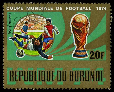 Republic of Burundi, - CIRCA 1974: A stamp printed by Burundi showing football players, circa 1974