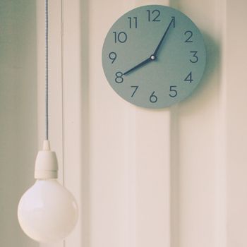 Modern lamp with wall clock, retro filter effect