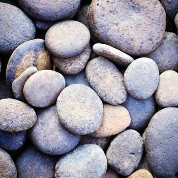 Pebble stone background for spa with retro filter effect