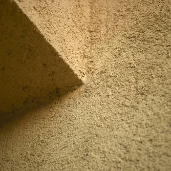 orange stucco wall close up