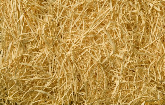 Yellow packing straw material background texture