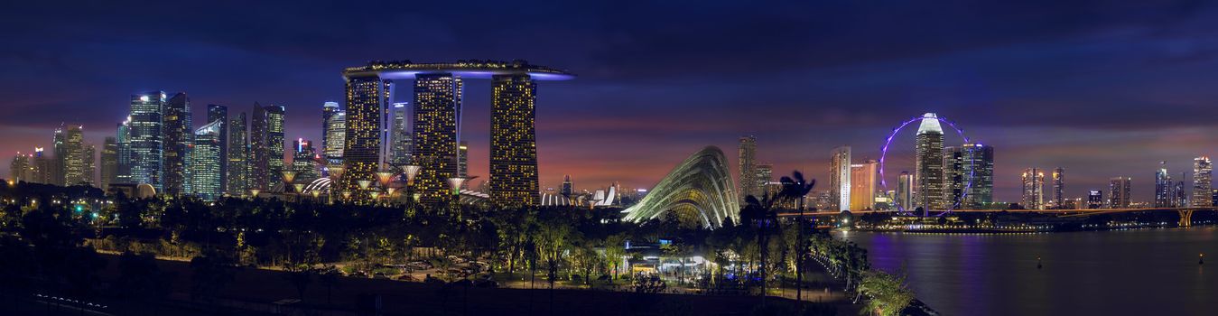 SINGAPORE - MAR 19 : Night View of the Marina Bay Sands Resort and Gardens by the Bay at the mouth of the Singapore River on March 19th, 2013 in Singapore. This waterfront resort and conservatory is a big tourist attraction.