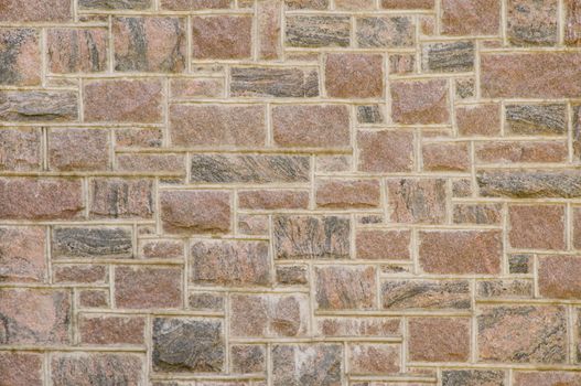 Black and reddish masonry block wall texture
