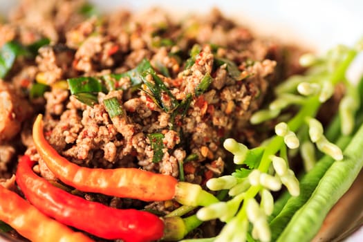 raw minced meat for thai food on a plate