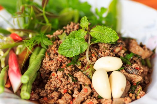 raw minced meat for thai food on a plate