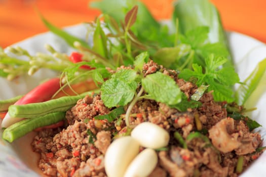 raw minced meat for thai food on a plate