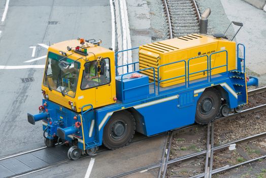 This hybrid machine is in use in port services and rail