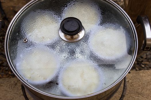 Traditional Thai dessert, made from Wax gourd or Chalkumra, sugar, and coconut milk, wrap with banana leaf.