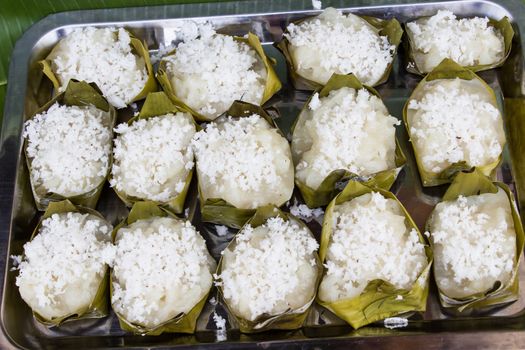 Traditional Thai dessert, made from Wax gourd or Chalkumra, sugar, and coconut milk, wrap with banana leaf.