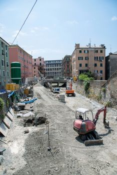 excavators on the bed of a stream