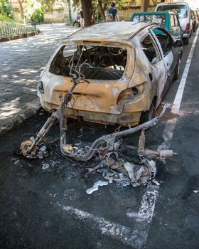 act of vandalism that ruined by a fire two vehicles