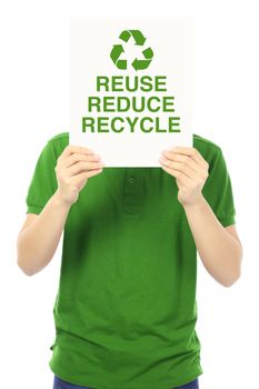 A young man holding a sign with an environmental message