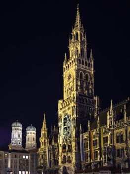 Night scene from Munich Town Hall and Frauenkirche in Germany Bavaria