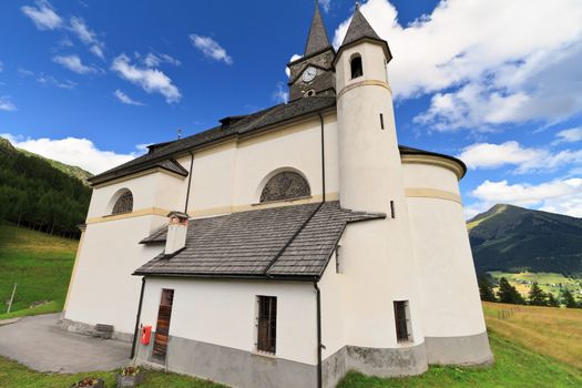 characteristic alpine church in Laste, Veneto Italy