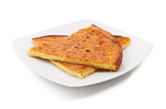 plate with italian farinata baked with chickpea flour over white background with clipping path