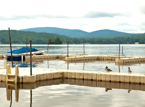 docks on a scenic lake in the adirondack mountains in new york state