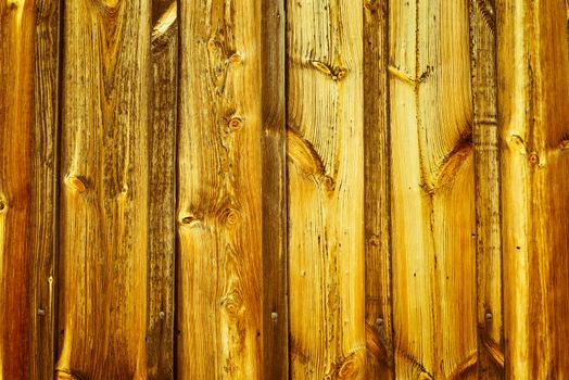 Old bright yellow wooden plank wall background