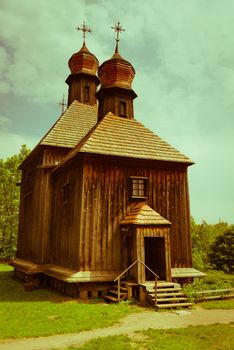 Vintage antique Slavonic wooden church at ethnographic museum Pirogovo, Kiev, Ukraine