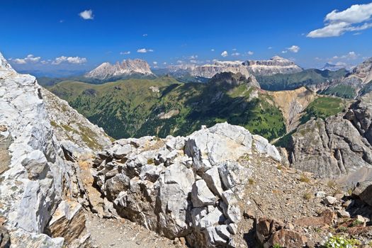 summer view of Dolomites with San Nicolo' valley, Sassolungo and Sella mount, Trentino, Italy