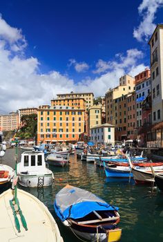 harbor with fishing boats in Camogli, famous small town in Liguria, Italy