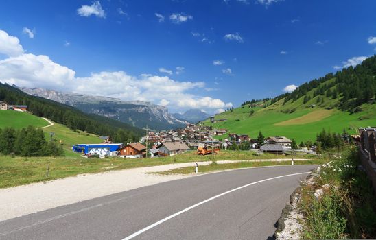 summer view of Val Badia with San Cassiano small village, Italy