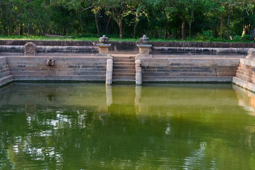 Ruins of the ancient city Anuradhapura, Sri Lanka. Kuttam Pokuna (twin ponds) are bathing tanks or pools in ancient Sri Lanka.