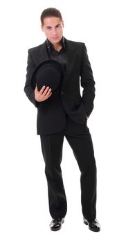 Elegant young man in black suit and hat derby isolated on white background