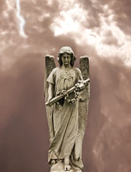sad angel statue, monument, holding cross with dramatic weather