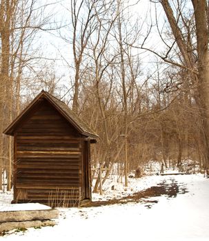 shack in the woods in winter